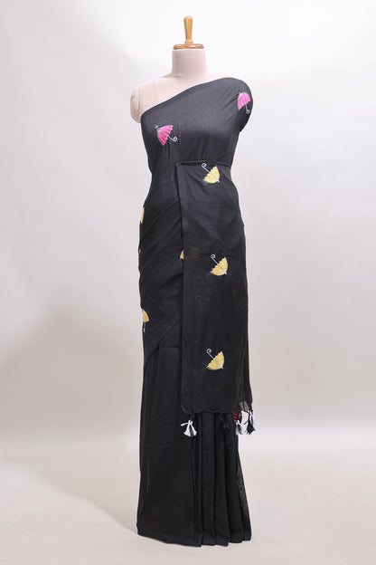 Borderless black umberla motifs design saree with contrast blouse and tassels