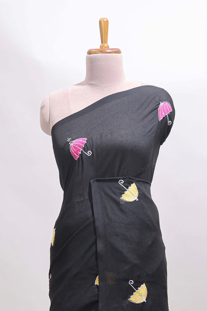 Borderless black umberla motifs design saree with contrast blouse and tassels