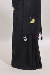 Borderless black umberla motifs design saree with contrast blouse and tassels