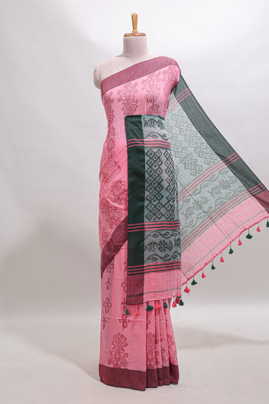 Pink floral design south cotton saree with contrast border and blouse