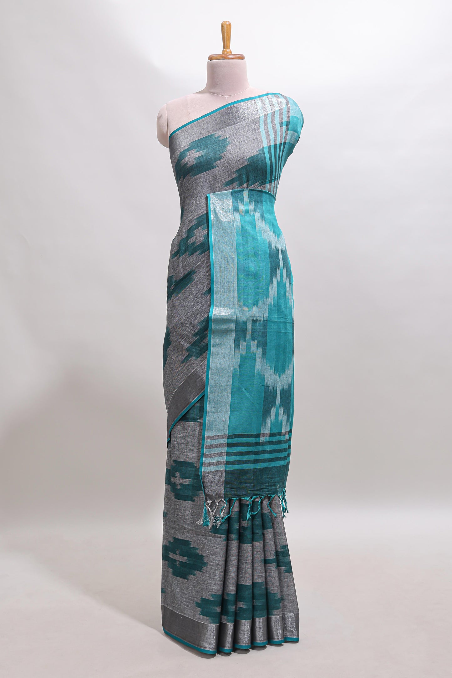 Grey ikkat style motifs south cotton saree with contrast silver zari border and blouse