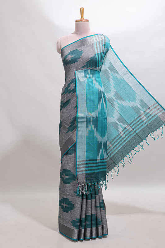 Grey ikkat style motifs south cotton saree with contrast silver zari border and blouse