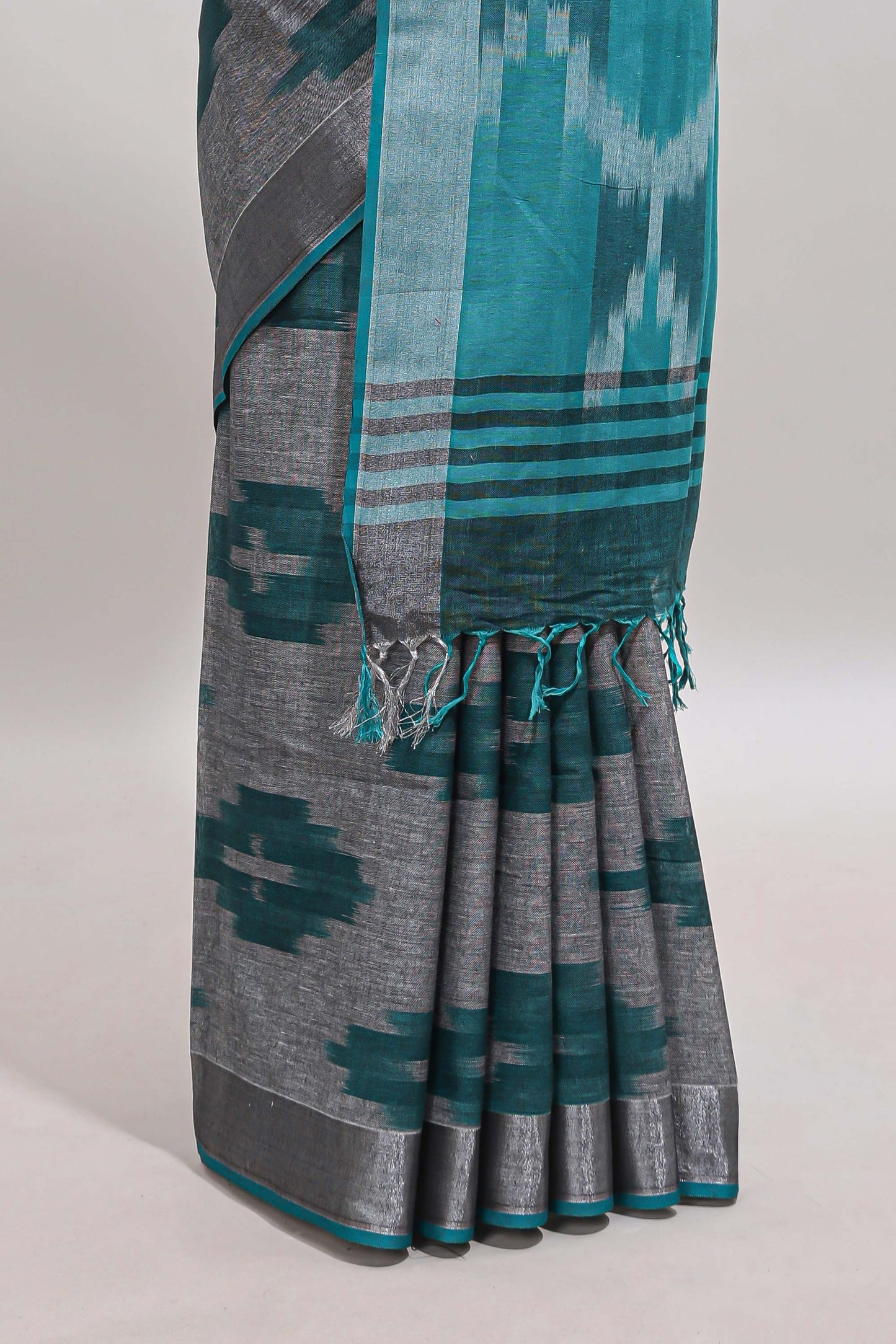Grey ikkat style motifs south cotton saree with contrast silver zari border and blouse