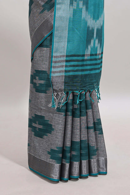 Grey ikkat style motifs south cotton saree with contrast silver zari border and blouse