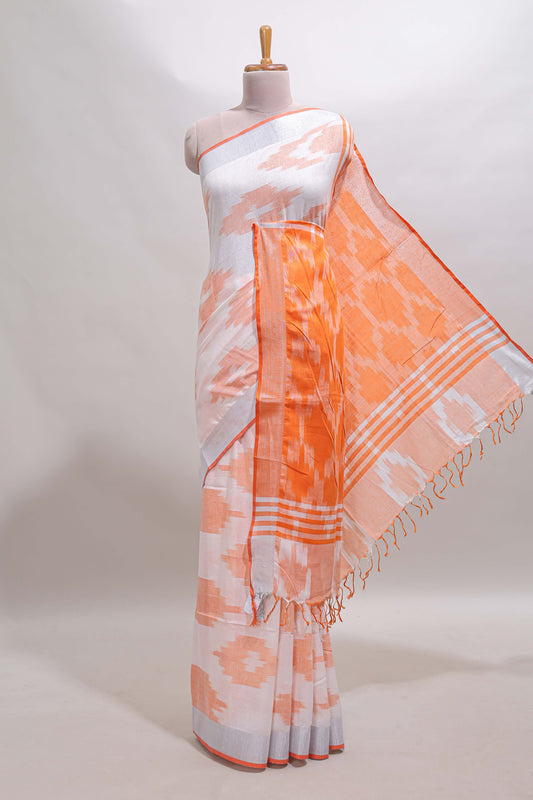White ikkat style motifs south cotton saree with contrast silver zari border and blouse