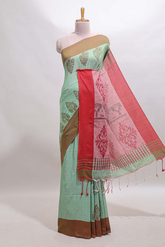 Green motifs south cotton saree with contrast border and blouse