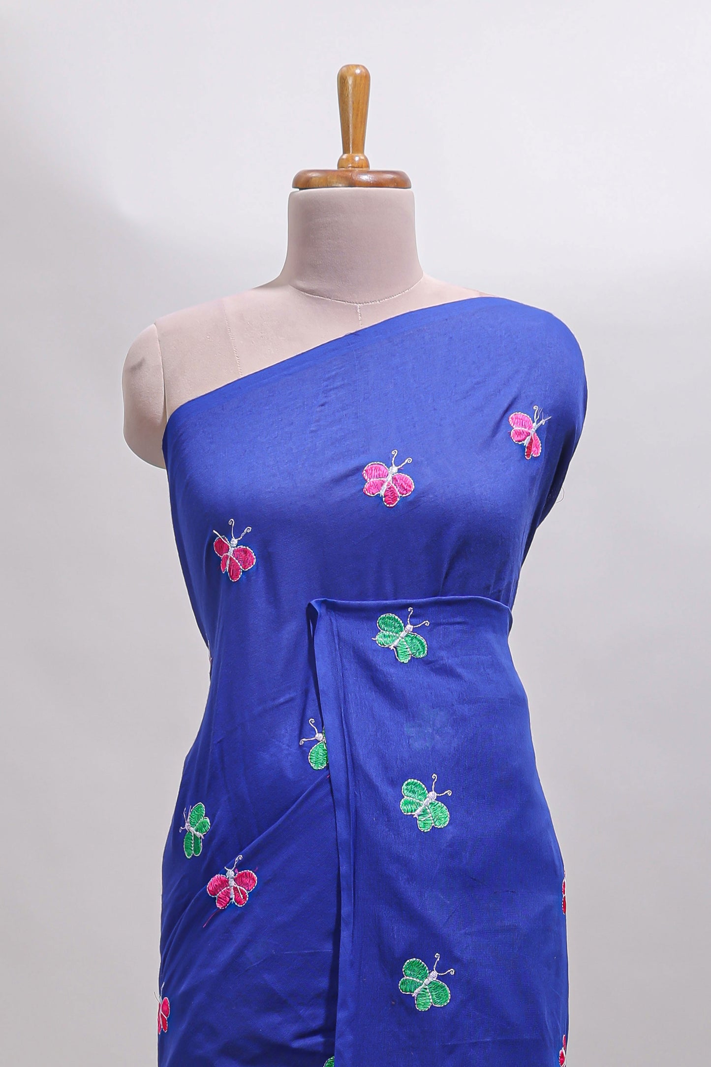Borderless blue butterfly motifs south cotton saree with contrast blouse and tassels