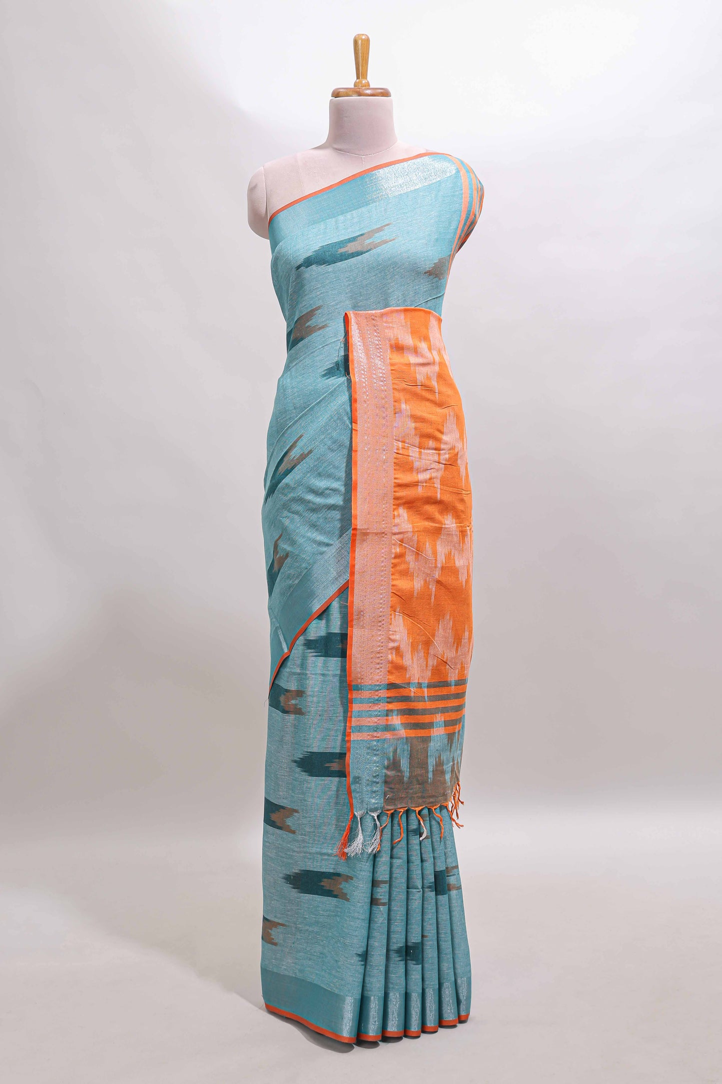 Blue ikkat style motifs south cotton saree with contrast border and blouse