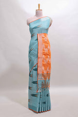 Blue ikkat style motifs south cotton saree with contrast border and blouse