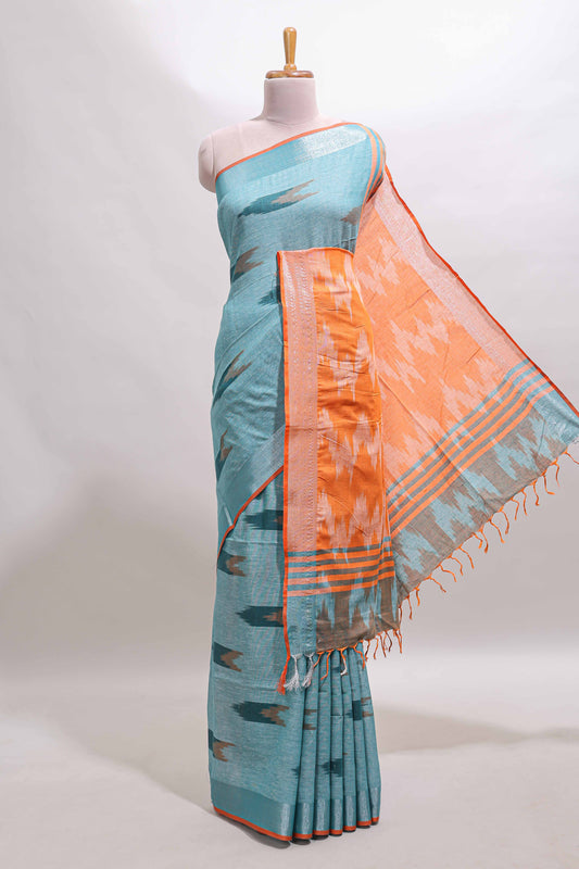 Blue ikkat style motifs south cotton saree with contrast border and blouse