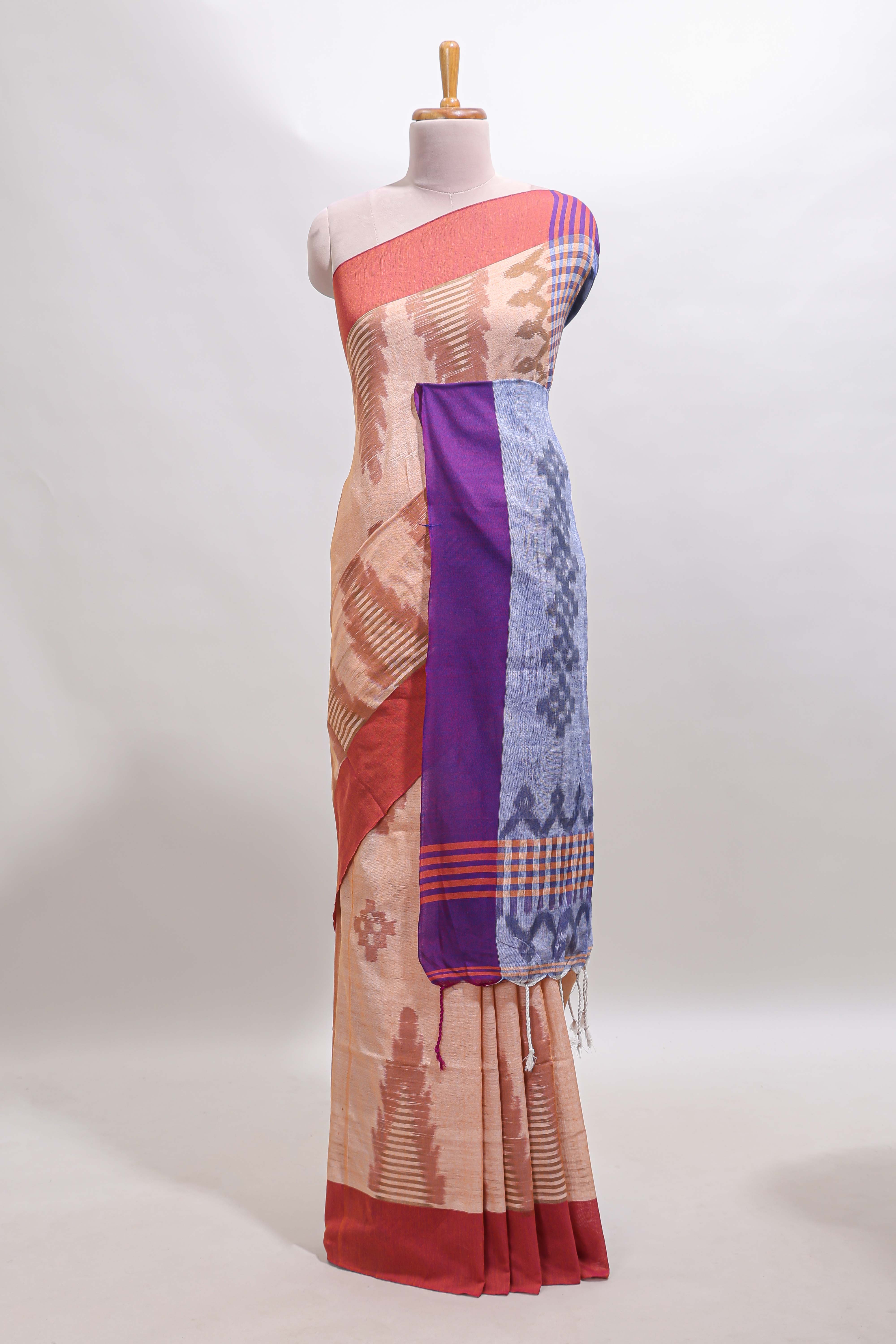 Beige ikkat style motifs south cotton saree with contrast border and blouse