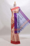 Beige ikkat style motifs south cotton saree with contrast border and blouse