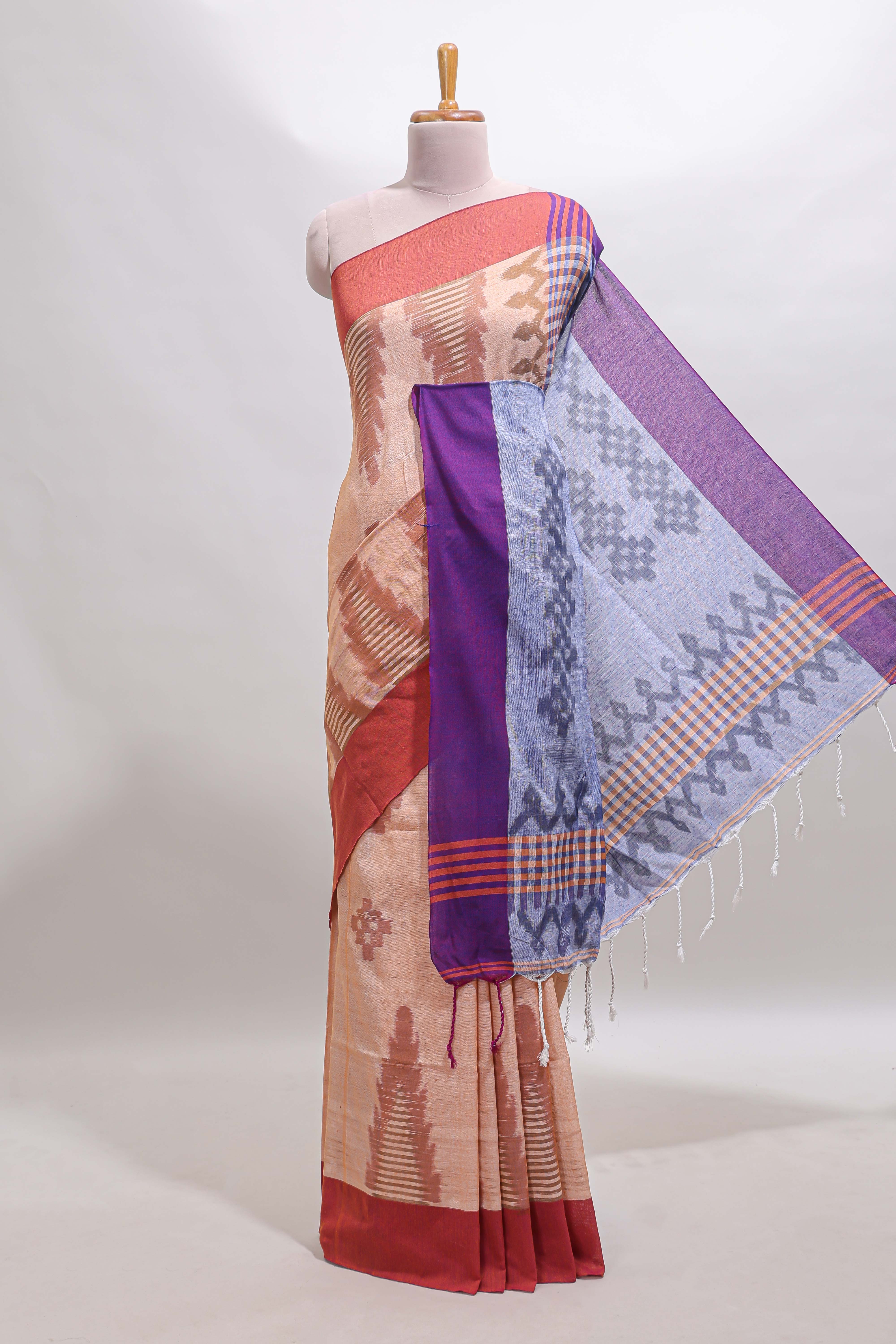 Beige ikkat style motifs south cotton saree with contrast border and blouse