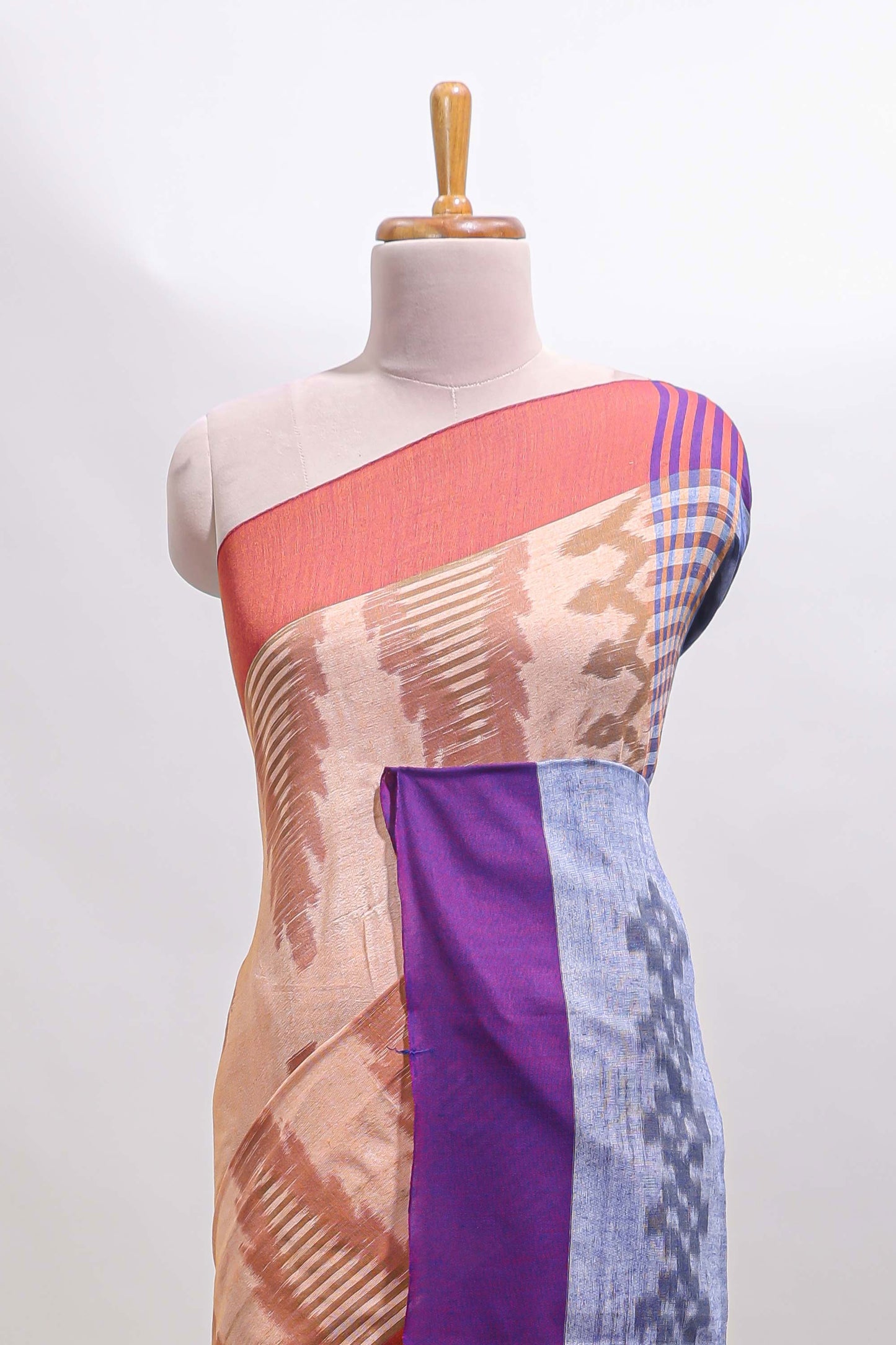 Beige ikkat style motifs south cotton saree with contrast border and blouse