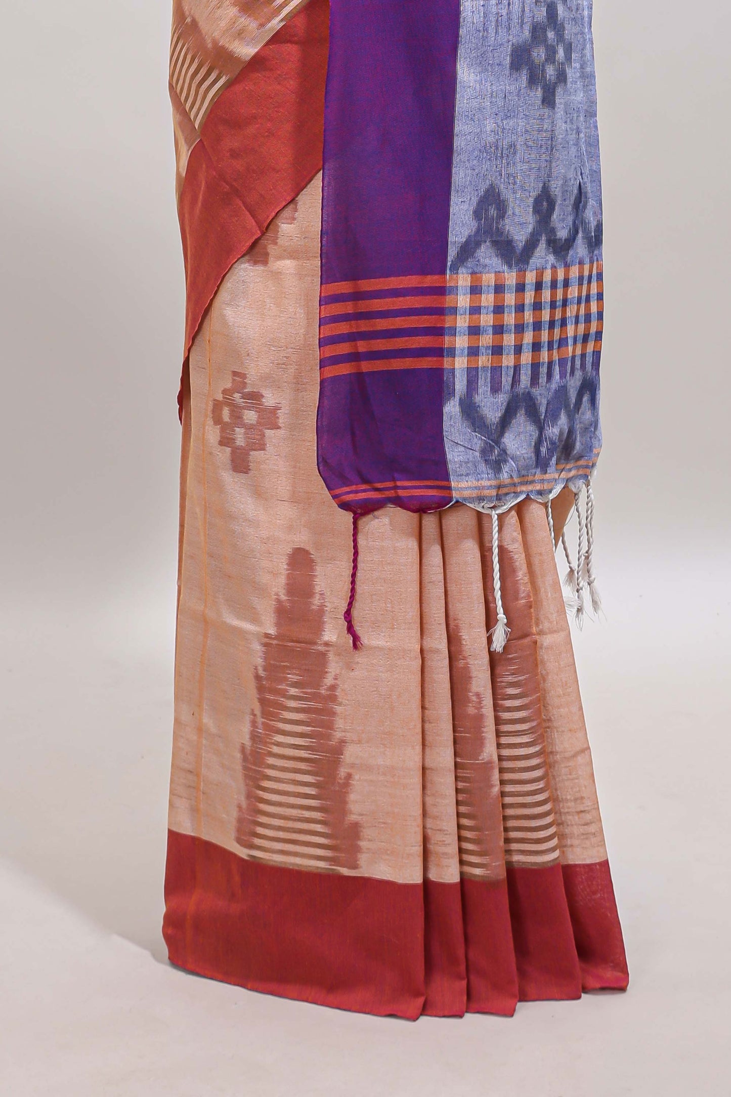 Beige ikkat style motifs south cotton saree with contrast border and blouse