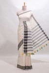 Cream thread butta south cotton saree with contrast border and striped pallu
