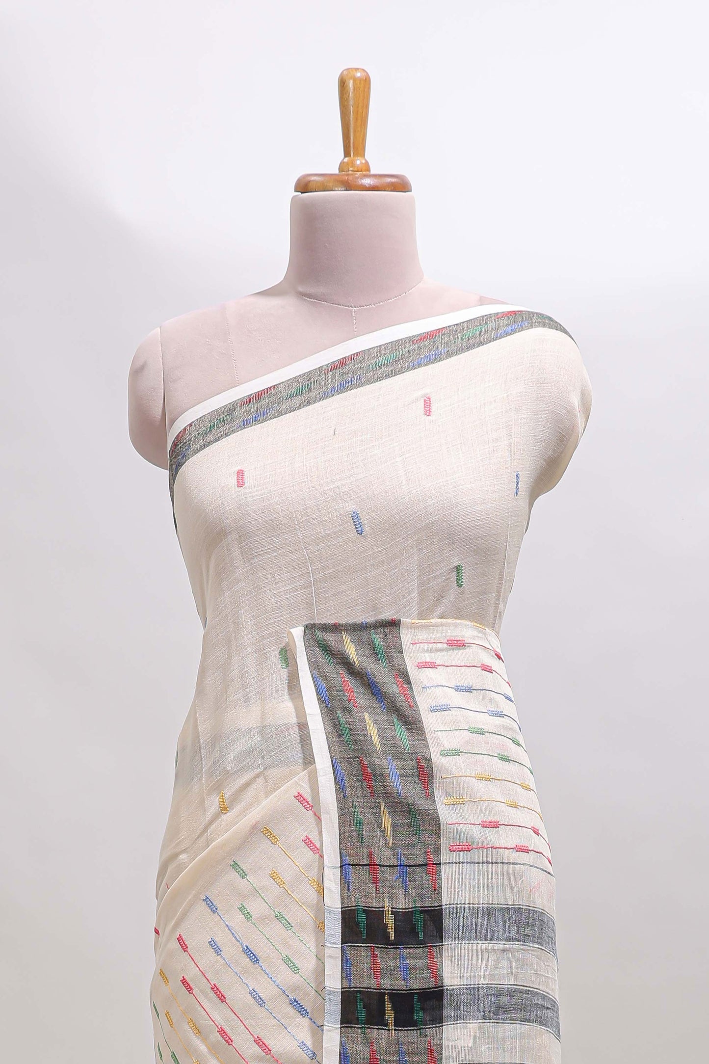 Cream thread butta south cotton saree with contrast border and striped pallu