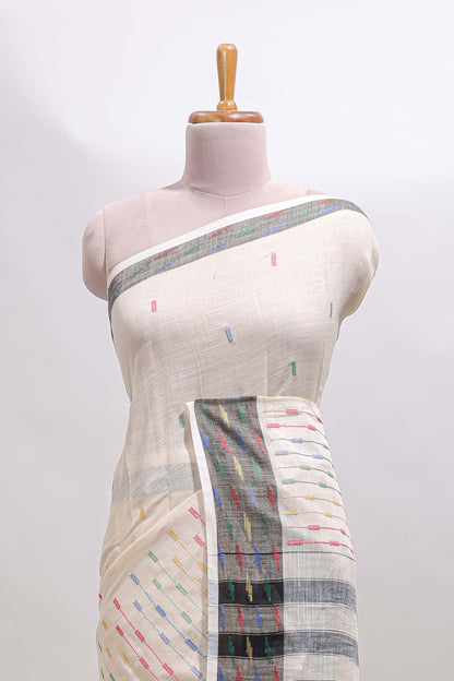 Cream thread butta south cotton saree with contrast border and striped pallu