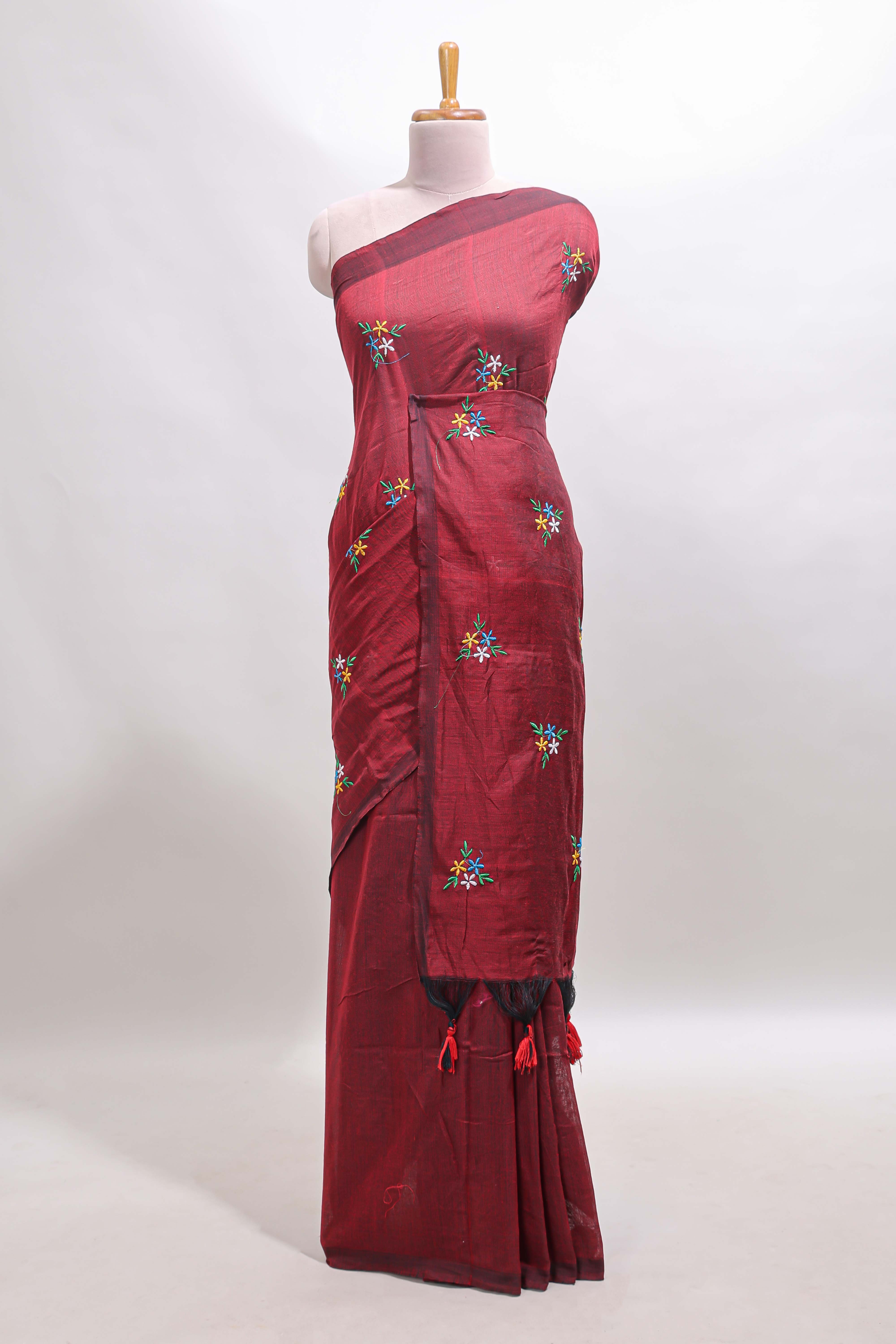 Maroon floral motifs south cotton sarees with self border and contrast printed blouse