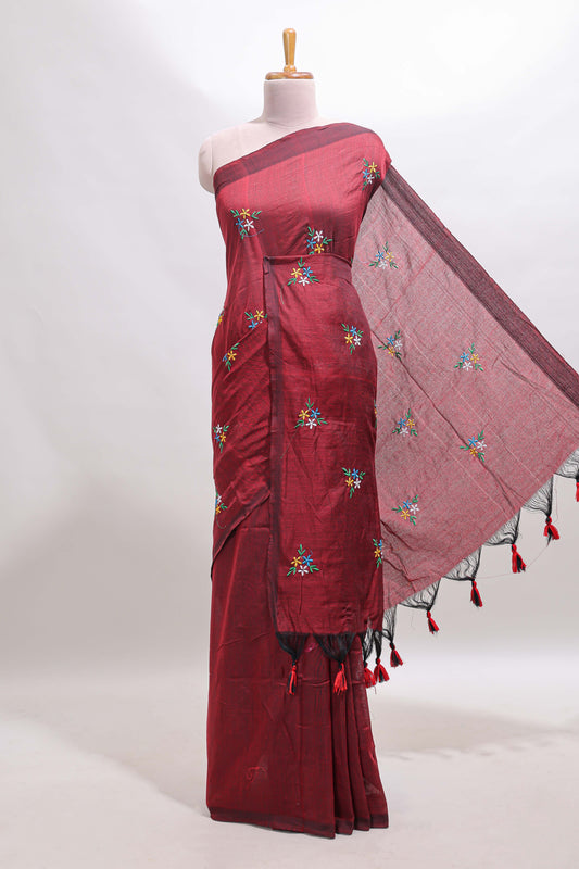 Maroon floral motifs south cotton sarees with self border and contrast printed blouse