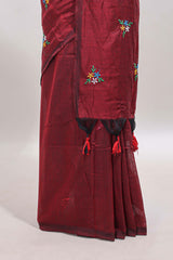 Maroon floral motifs south cotton sarees with self border and contrast printed blouse