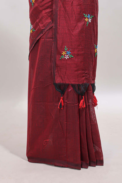 Maroon floral motifs south cotton sarees with self border and contrast printed blouse