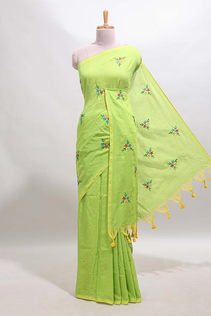 Green floral motifs south cotton sarees with self border and contrast printed blouse