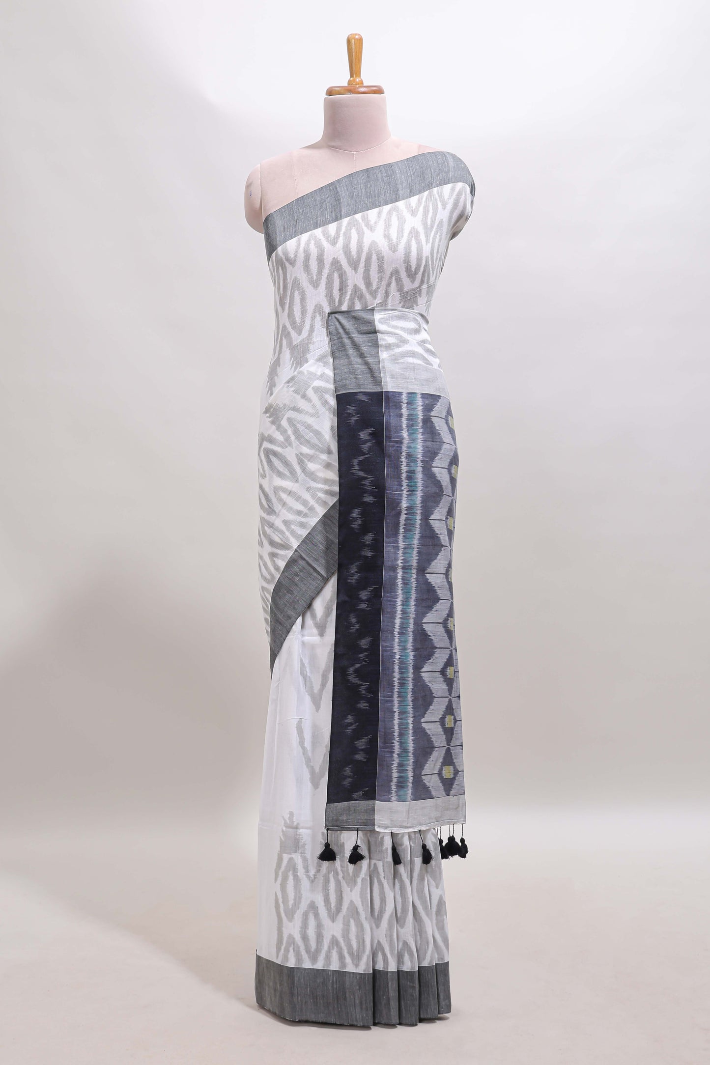 White geometric motifs south cotton sarees with contrast border and matching blouse