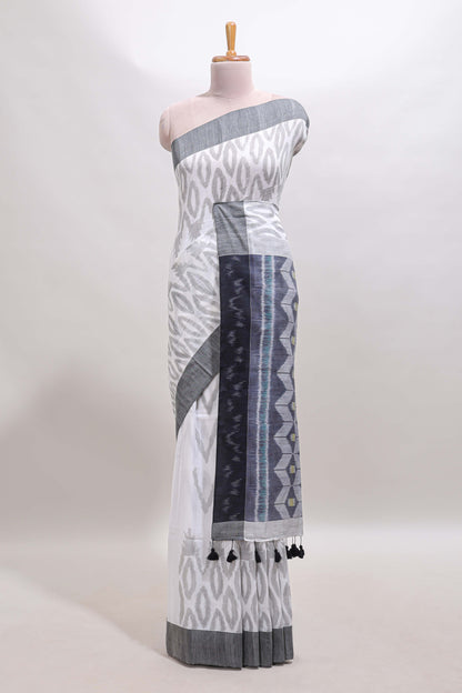 White geometric motifs south cotton sarees with contrast border and matching blouse