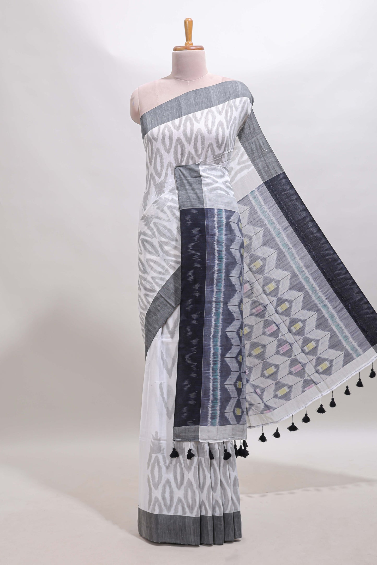 White geometric motifs south cotton sarees with contrast border and matching blouse