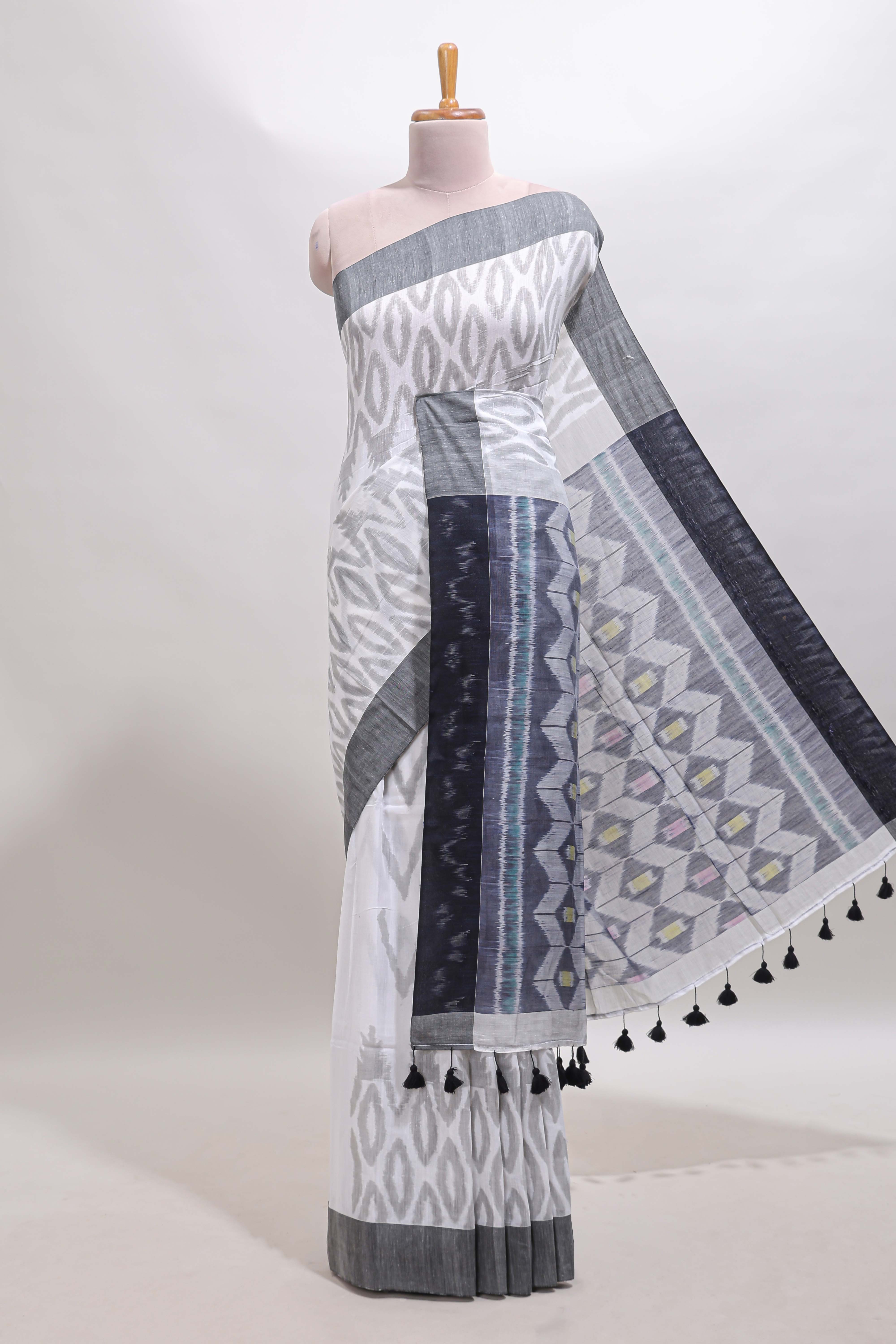 White geometric motifs south cotton sarees with contrast border and matching blouse