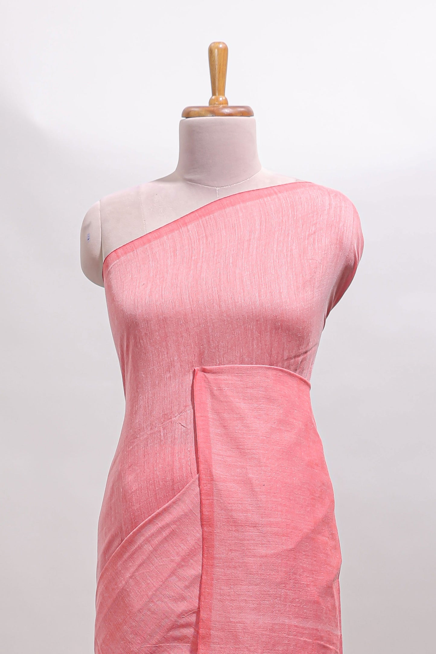 Borderless peach plain south cotton sarees with matching printed blouse and self pallu tassels
