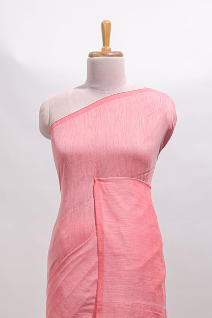 Borderless peach plain south cotton sarees with matching printed blouse and self pallu tassels
