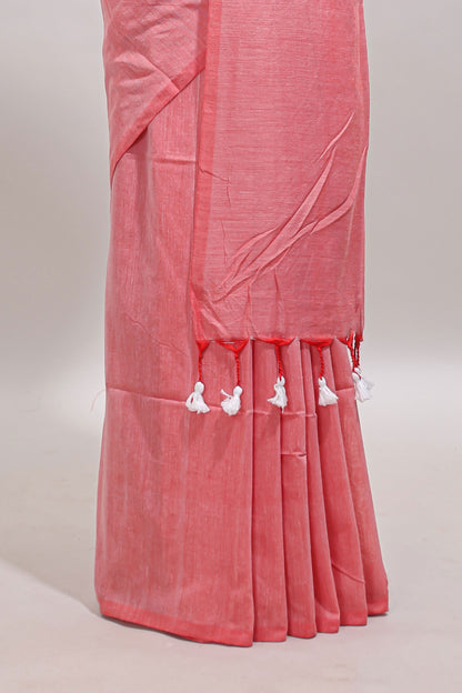 Borderless peach plain south cotton sarees with matching printed blouse and self pallu tassels