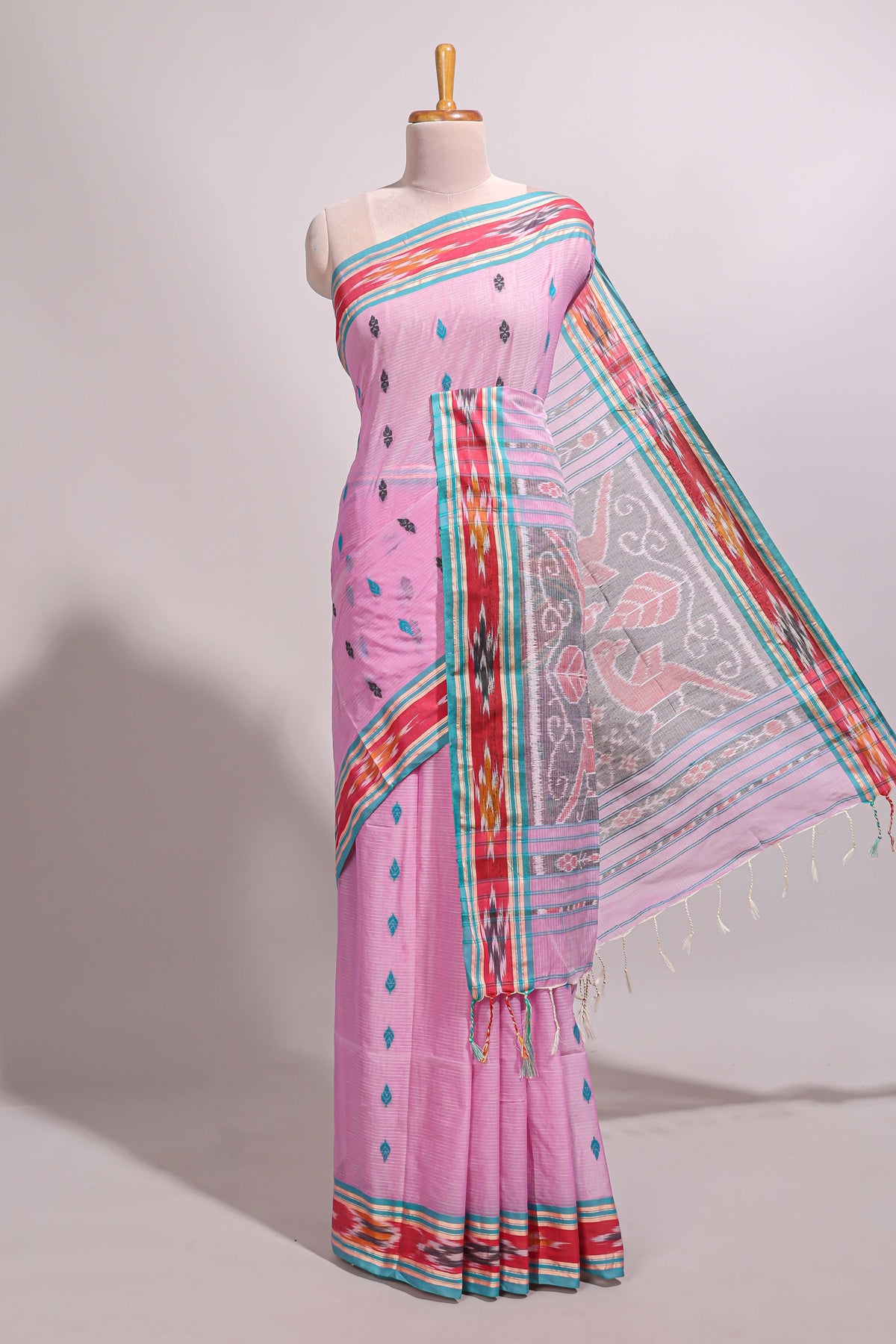 Pastel pink south cotton saree body with woven buttas  border featuring multicolour Ikat patterns woven pallu with a matching blouse