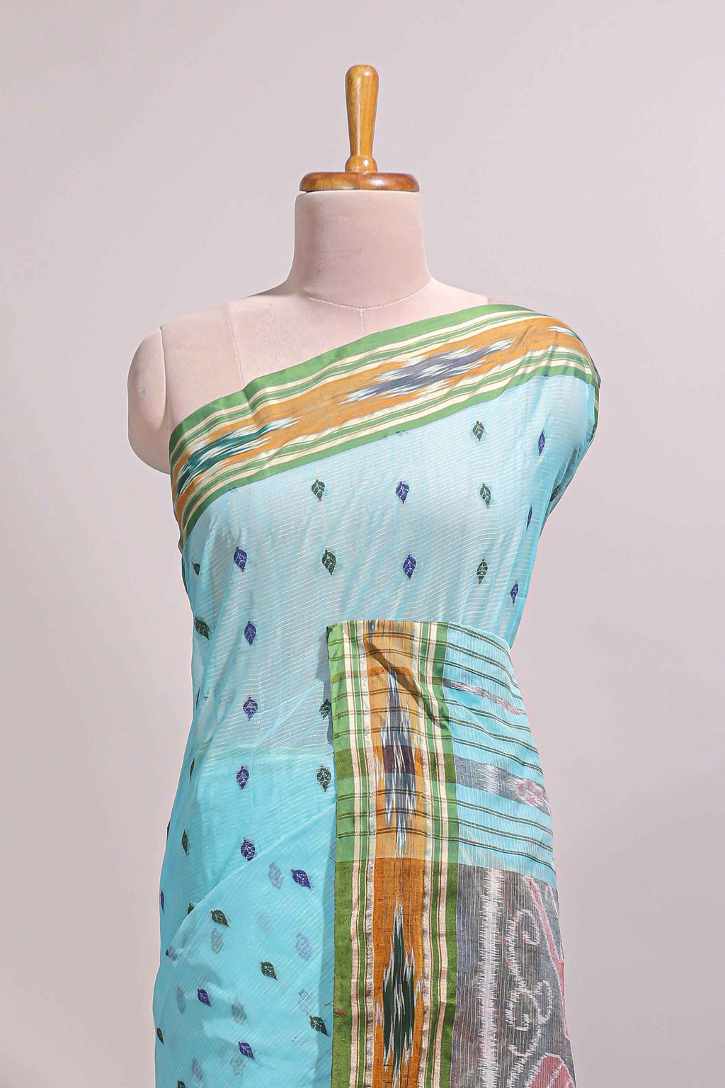 Pastel blue south cotton saree body with woven buttas  border featuring multicolour Ikat patterns woven pallu with a matching blouse