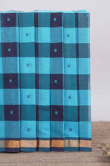 Blue cheked floral motifs design south cotton saree with self zari border and matching pallu