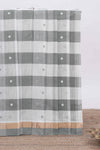 Grey cheked floral motifs design south cotton saree with self zari border and matching pallu