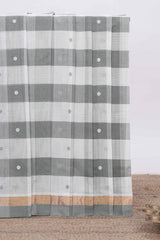 Grey cheked floral motifs design south cotton saree with self zari border and matching pallu