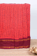Pink tamil script print sungudi cotton saree with contrast zari bentex border and pallu