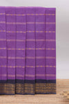 Purple Sungudi cotton saree with gold zari stripe motifs a contrastingzari border checked pallu and contrast blouse