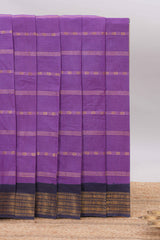 Purple Sungudi cotton saree with gold zari stripe motifs a contrastingzari border checked pallu and contrast blouse