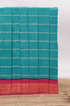 Rama green Sungudi cotton saree with gold zari stripe motifs a contrasting  zari border checked pallu and contrast blouse