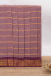 Dark peach Sungudi cotton saree with gold zari stripe motifs a contrastingzari border checked pallu and contrast blouse