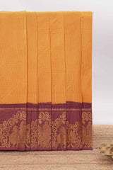Deep Mustard yellow Chettinad cotton saree with checked body contrasting peacock zari border striped pallu and a matching checked blouse