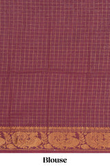 Deep Mustard yellow Chettinad cotton saree with checked body contrasting peacock zari border striped pallu and a matching checked blouse