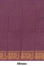 Pink sungudi cotton saree with checked body contrasting peacock zari border striped pallu and a matching checked blouse