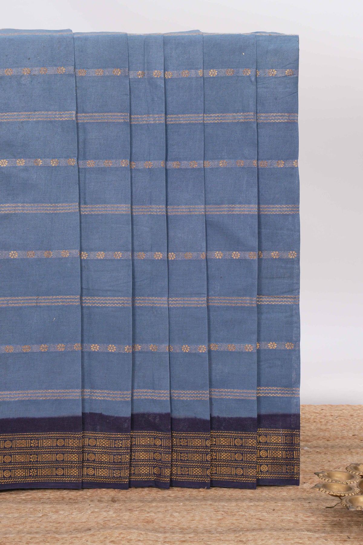 Indigo Blue Sungudi cotton saree with gold zari stripe motifs a contrasting  zari border checked pallu and contrast blouse