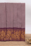 Muted Lavender Chettinad cotton saree with checked body contrasting peacock zari border striped pallu and blouse