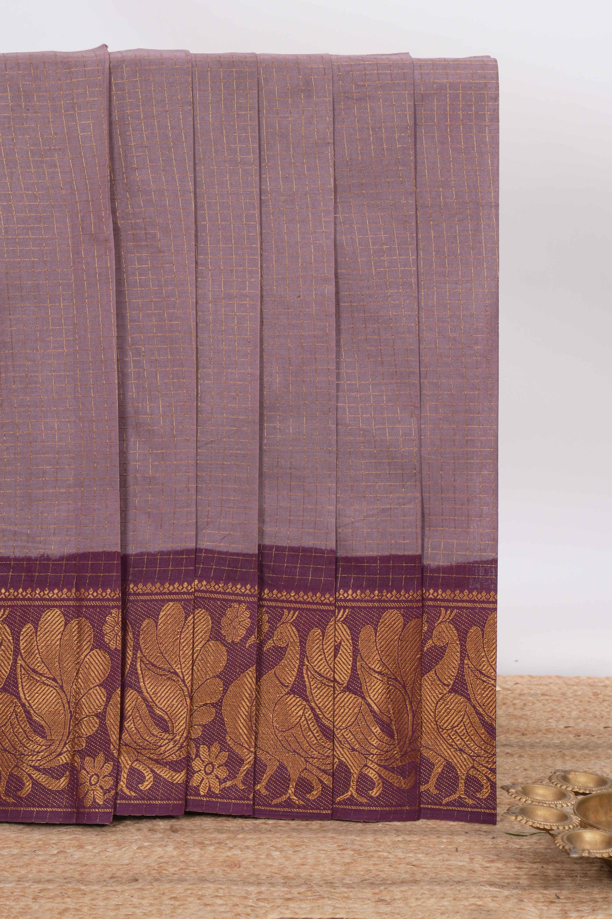 Muted Lavender Sungadi cotton saree with checked body contrasting peacock zari border striped pallu and blouse